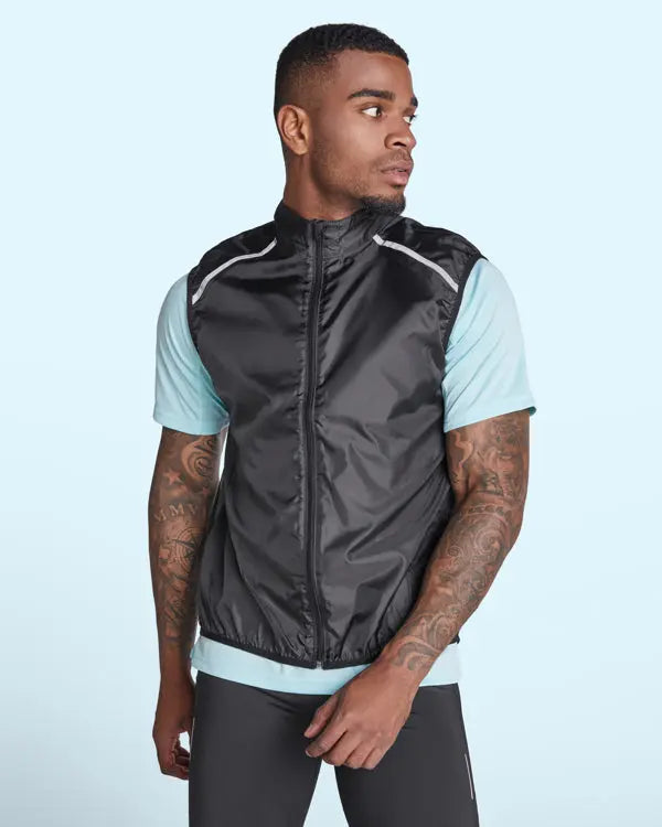 Chaleco técnico ligero de running, con cremallera frontal a tono con protector de barbilla Vetonek