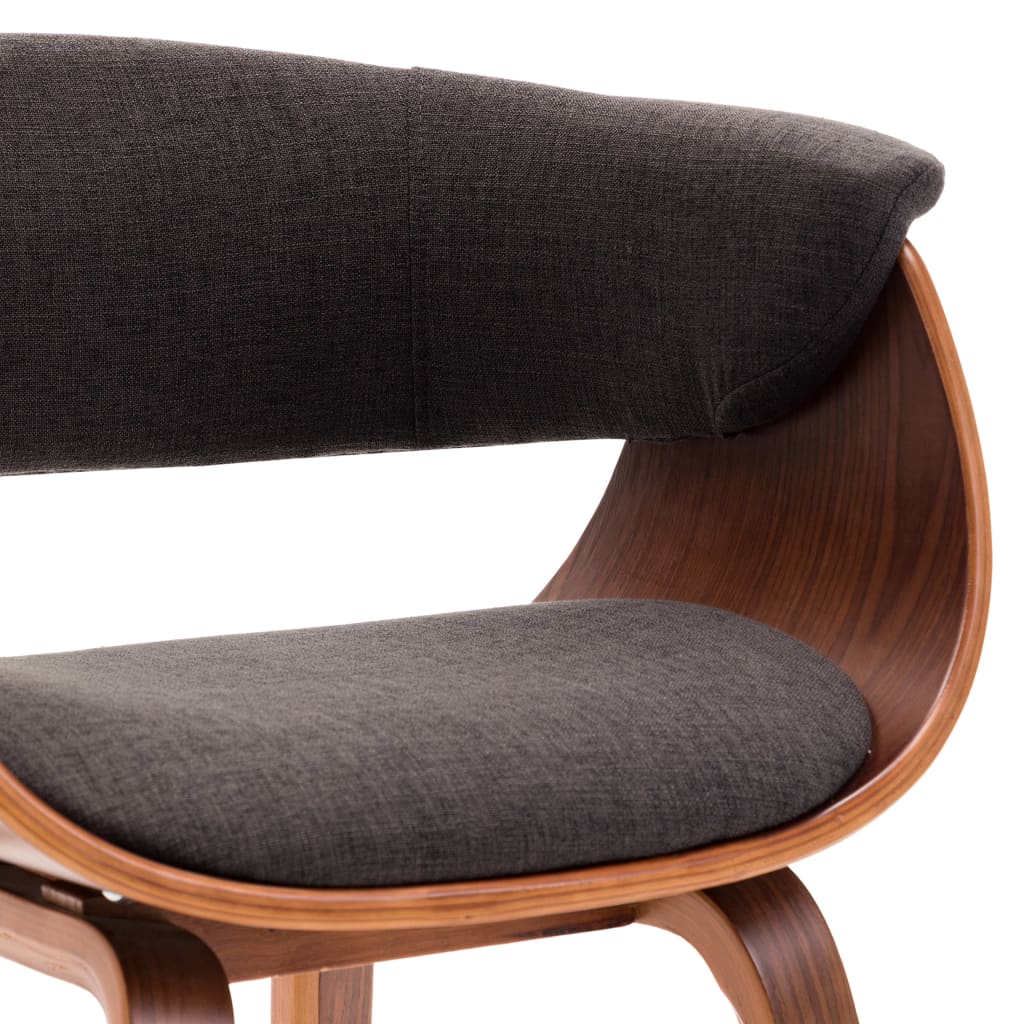 Curvated wooden chair and gray fabric