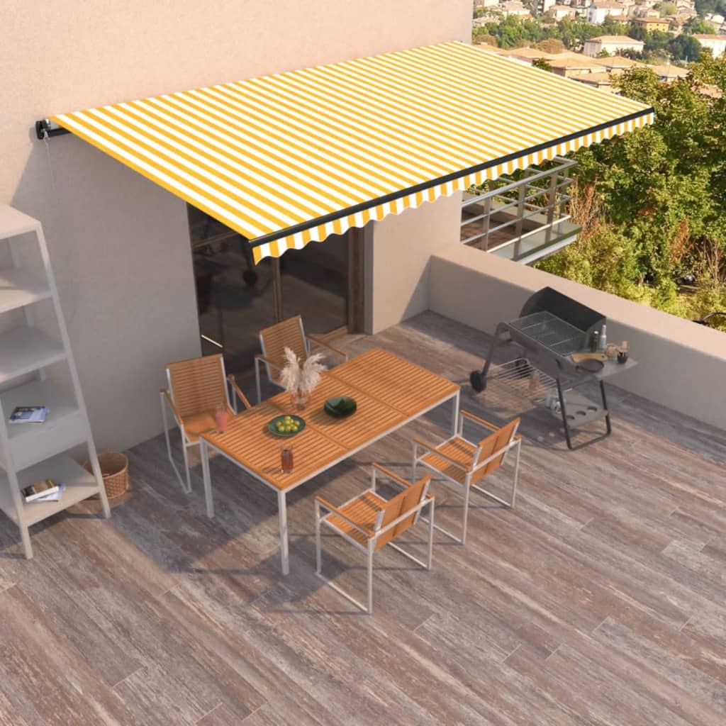 Vetonek Toldo retráctil manual amarillo y blanco 600x350 cm