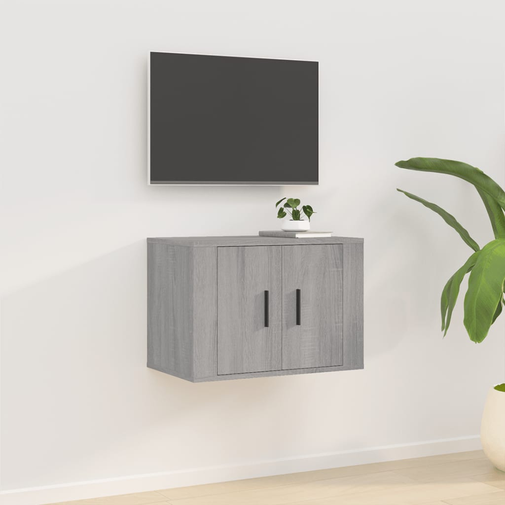 Mueble para TV de pared gris Sonoma con diseño elegante, almacenamiento práctico y planta decorativa.