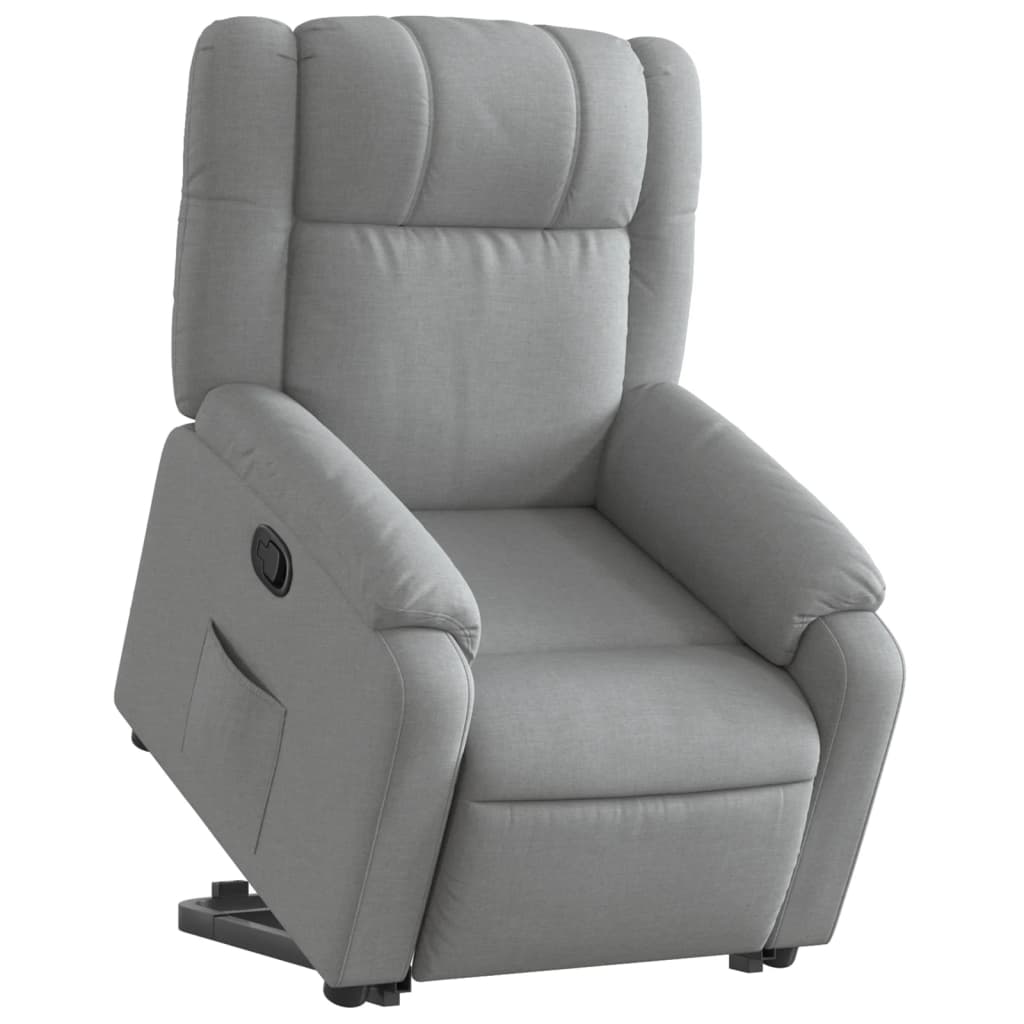 Reinclinable armchair of light gray fabric