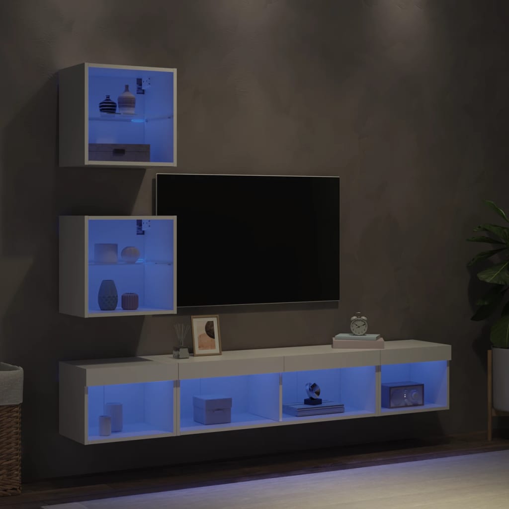 Muebles de TV de pared con iluminación LED RGB en blanco, ideales para maximizar espacio y mantener el suelo despejado.