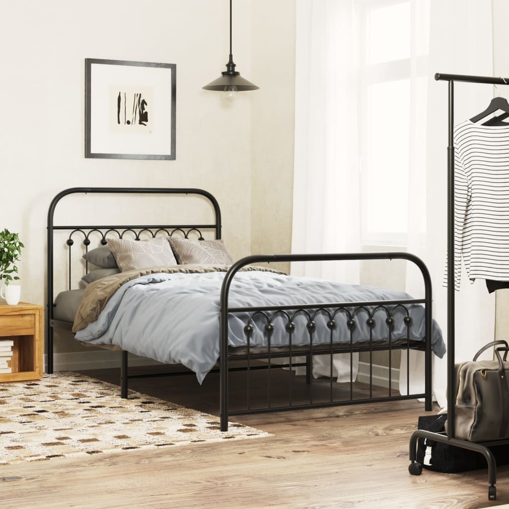 Estructura de cama metal negra 100x190 cm en dormitorio moderno con edredón gris y decoración elegante.