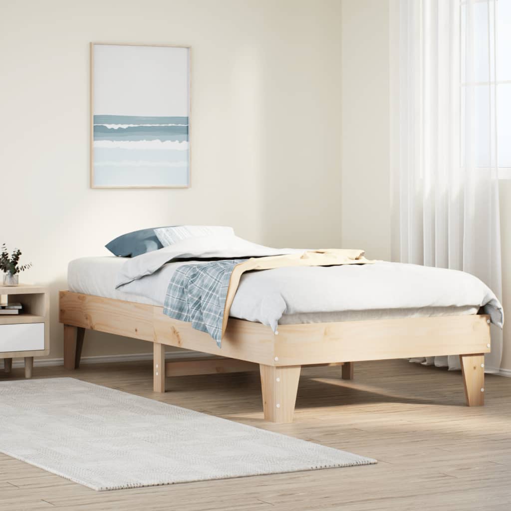 Estructura de cama de madera maciza de pino 75x190 cm en un dormitorio minimalista y acogedor.