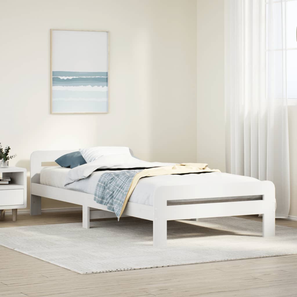 Estructura de cama blanca de madera maciza en dormitorio moderno, tamaño 75x190 cm, sin colchón.