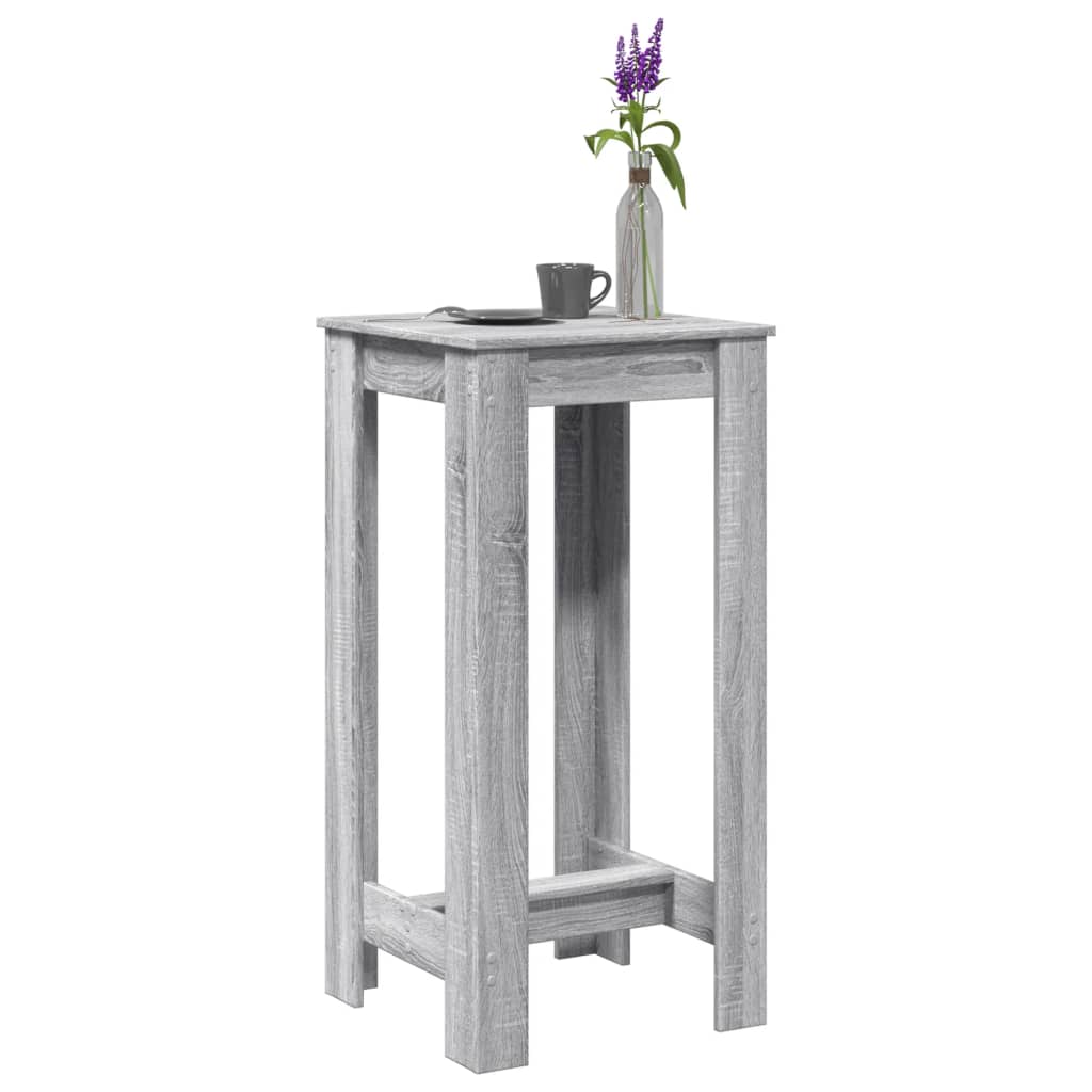 Mesa alta de bar de madera gris con jarrón y flores, ideal para cocina o sala de estar, dimensiones 51x50x103,5 cm.