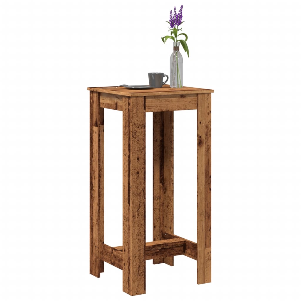 Mesa alta de bar de madera de ingeniería envejecida con planta y taza, ideal para cocina o comedor.