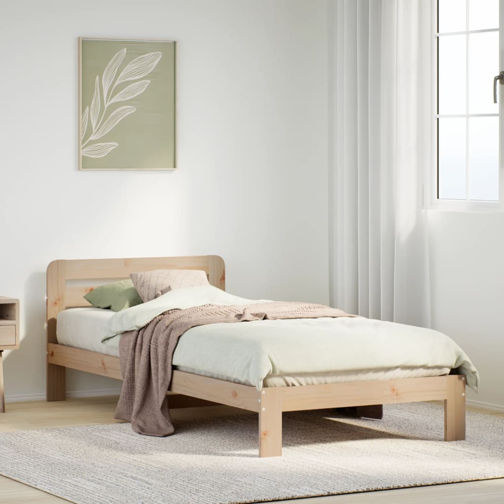 Estructura de cama de madera de pino 90x190 cm en dormitorio acogedor con decoración moderna.