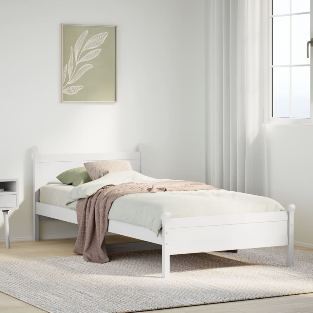 Estructura de cama blanca de madera maciza 75x190 cm en dormitorio acogedor con decoración minimalista.