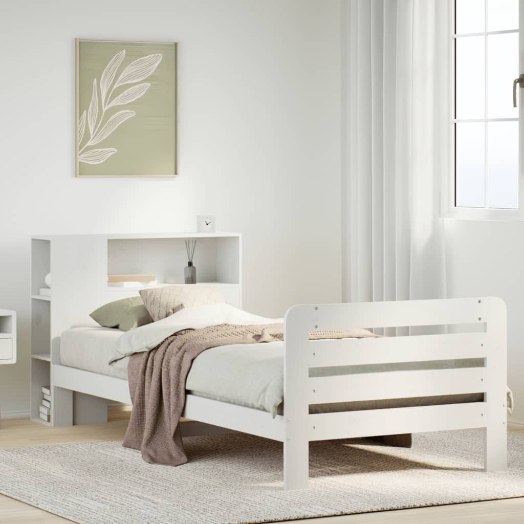 Estructura de cama blanca de madera maciza 75x190 cm con decoración acogedora en un dormitorio moderno.