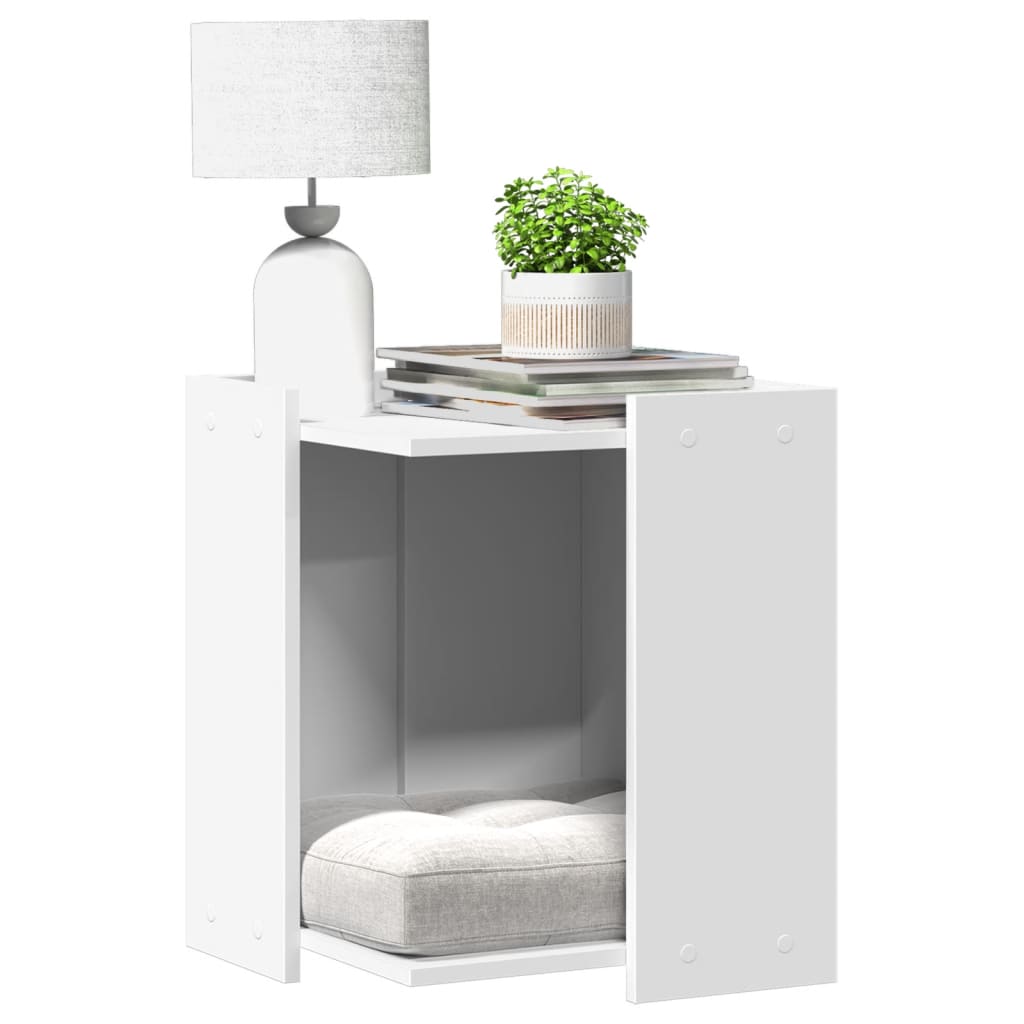 Mueble arenero para gatos blanco con lámpara y planta, diseño elegante y funcional, espacio privado para mascotas.