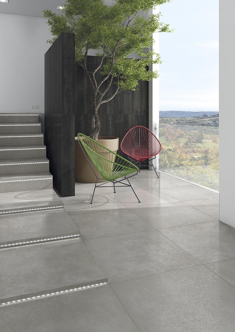 Ambiente terraza con suelo efecto cemento Rimini Cemento 80x80 - Vetonek