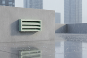 Persiana de ventilación de hormigón instalada en el muro de una terraza urbana bajo la lluvia - Vetonek