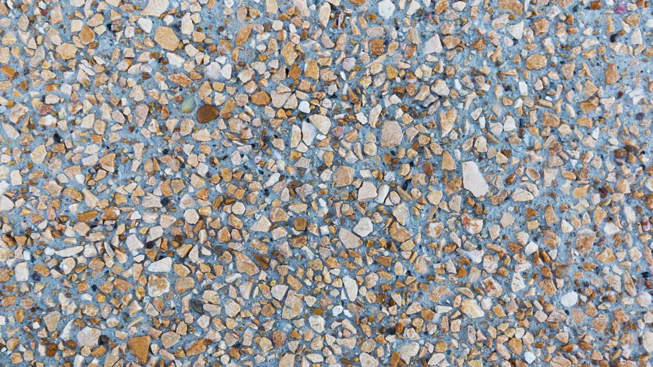 Abujardado Químico Vetonek: Aceite desactivante para Pavimentos de Hormigón de Árido Visto - Vetonek