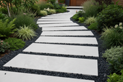 white slabs 120x60x2 cm black gravel path