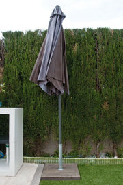 Pie de Sombrilla Quel en terraza