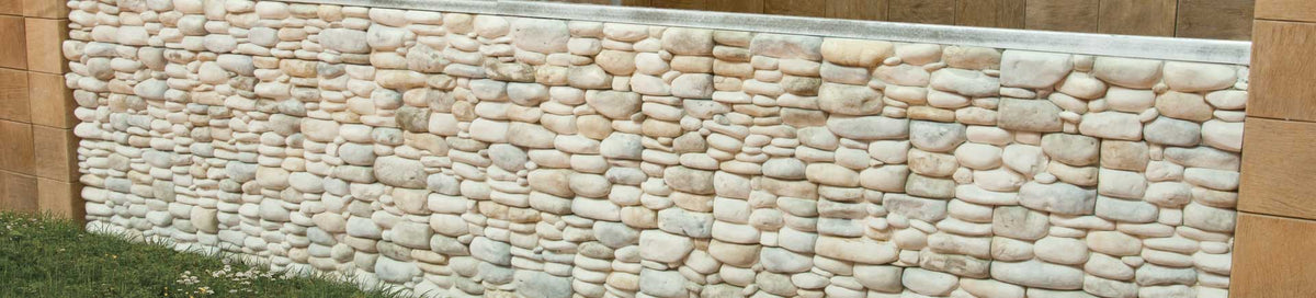 Muro con Revestimiento Azagra de canto rodado