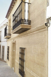 Fachada con tapacables Cordovín integrado