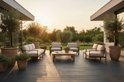 Terraza moderna al atardecer pavimentada con Pavimento Albarracín Aspecto Madera de hormigón en antracita - Vetonek